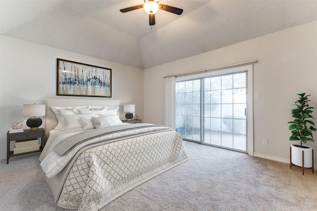 bedroom featuring ceiling fan, access to exterior, vaulted ceiling, baseboards, and carpet