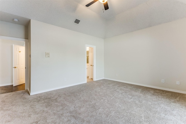 unfurnished room featuring carpet flooring, a ceiling fan, baseboards, and visible vents