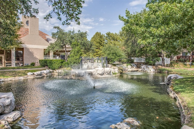 property view of water with a small pond