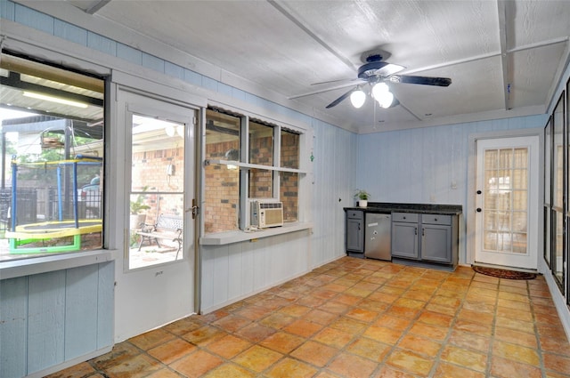 kitchen featuring refrigerator, gray cabinets, a ceiling fan, a sunroom, and cooling unit