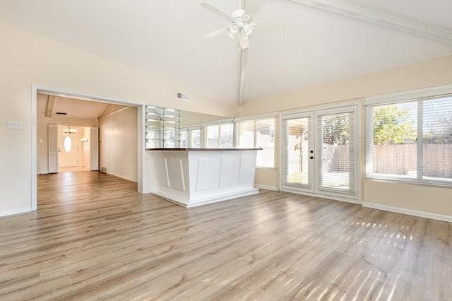 interior space featuring vaulted ceiling and ceiling fan