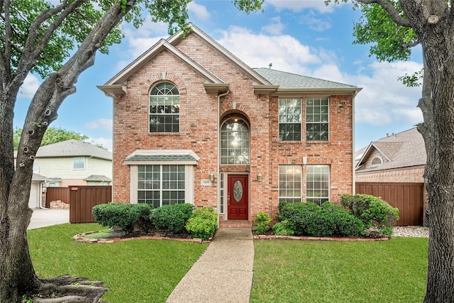 view of front of property with a front lawn