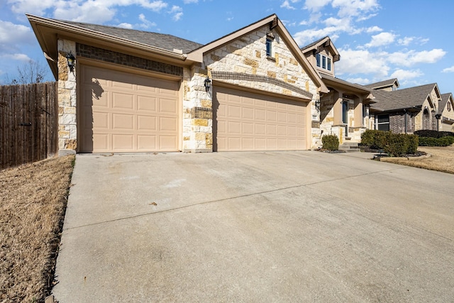 ranch-style house featuring a garage