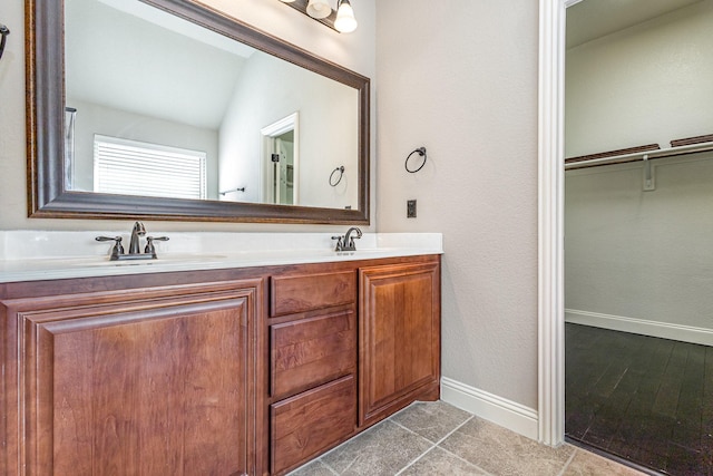 bathroom featuring vanity and tile patterned floors