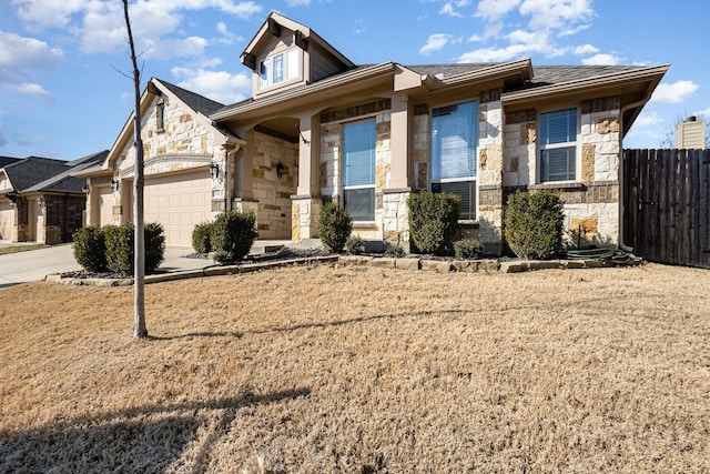 view of front of property featuring a garage