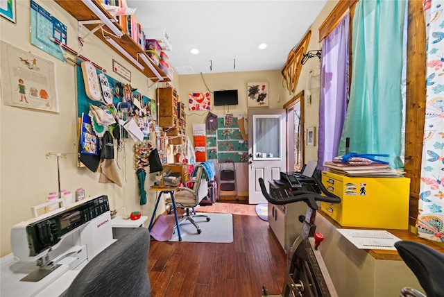 home office with hardwood / wood-style flooring