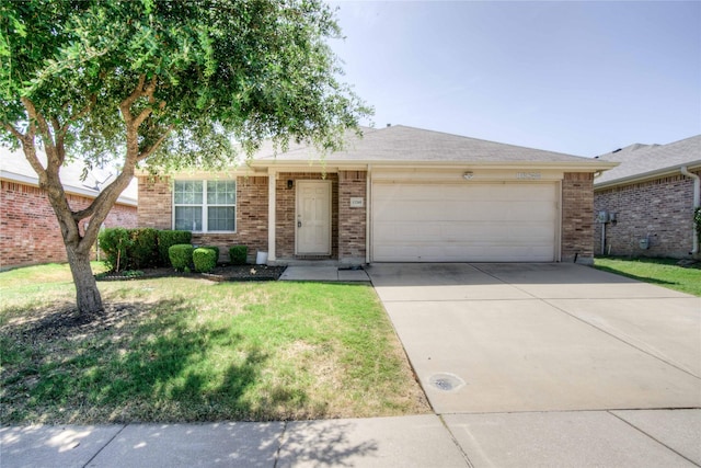 single story home featuring a garage and a front lawn