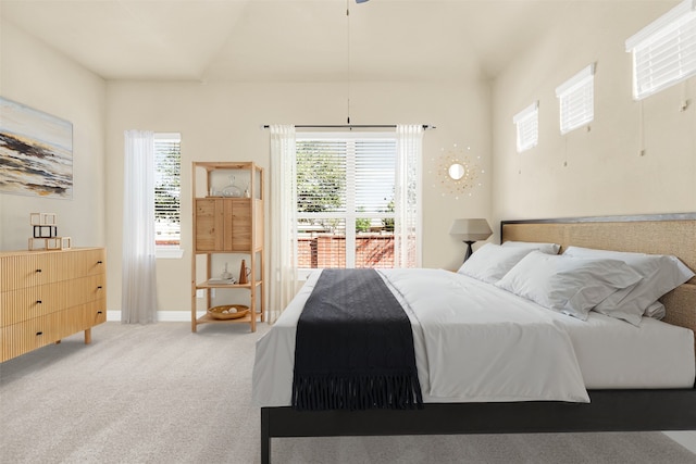 bedroom featuring carpet flooring and baseboards