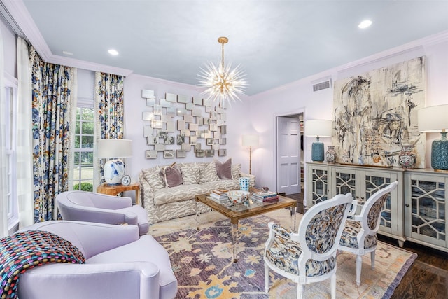 living room with crown molding, dark wood-type flooring, and a chandelier