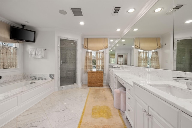 bathroom with vanity, crown molding, and plus walk in shower