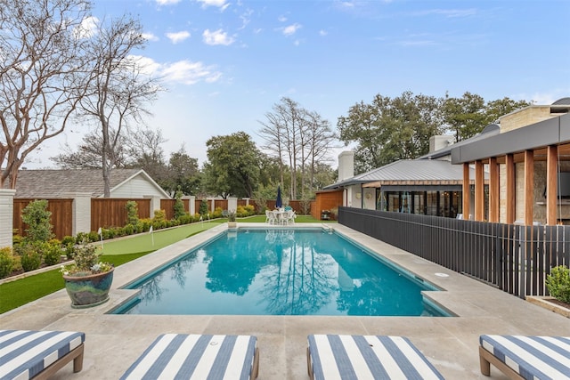 view of pool featuring a patio area