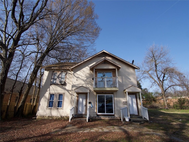 view of front of property with a balcony