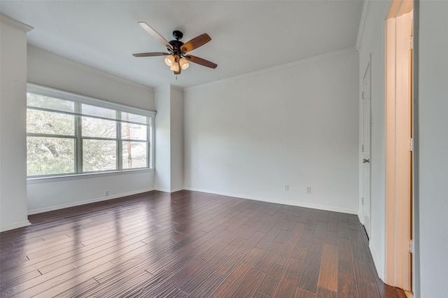 empty room featuring crown molding, dark hardwood / wood-style floors, and ceiling fan