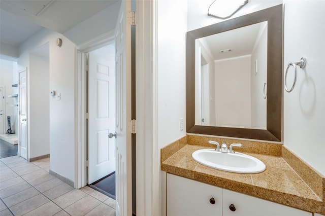 bathroom with vanity and tile patterned floors