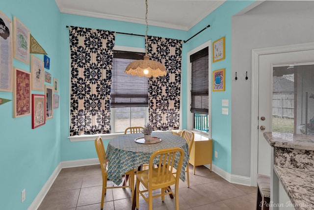 tiled dining room with crown molding