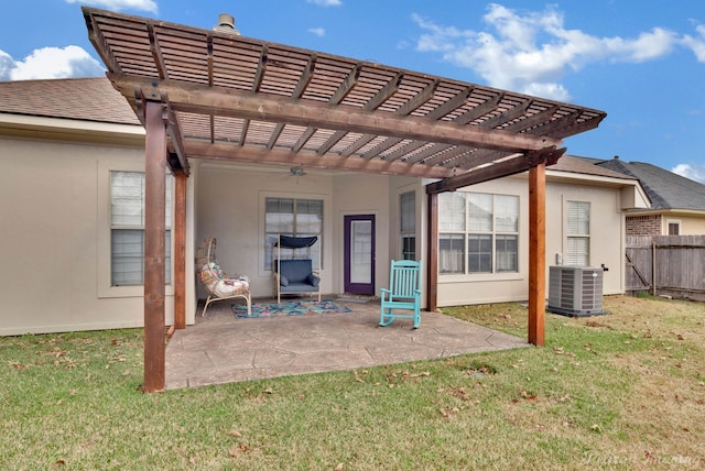 back of property with a patio area, a lawn, a pergola, cooling unit, and ceiling fan