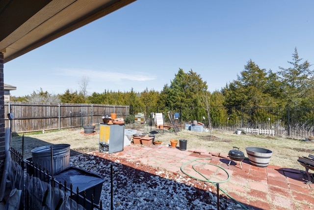 view of patio featuring a fenced backyard