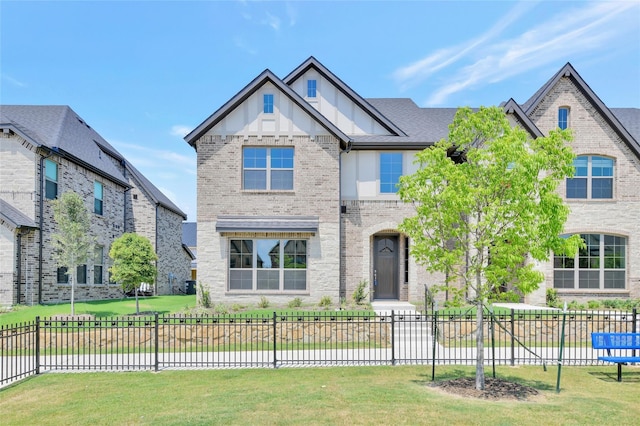 view of front of property with a front lawn