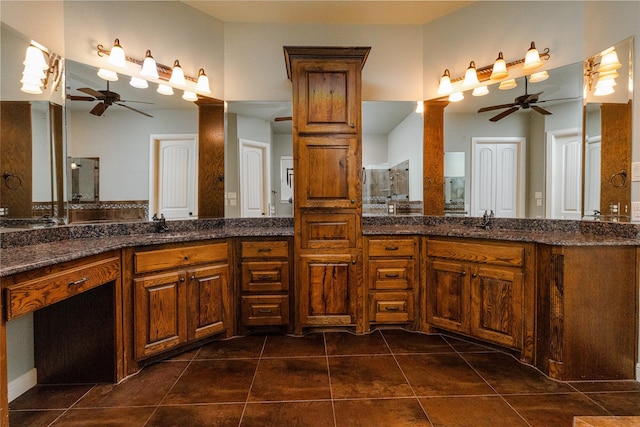 bathroom featuring vanity, tile patterned floors, and ceiling fan