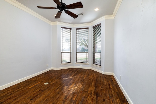 spare room featuring hardwood / wood-style flooring, ornamental molding, and ceiling fan