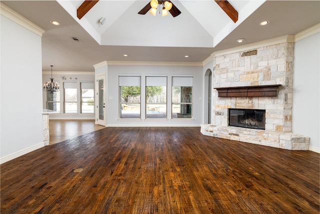 unfurnished living room with crown molding, a stone fireplace, ceiling fan with notable chandelier, and dark hardwood / wood-style flooring