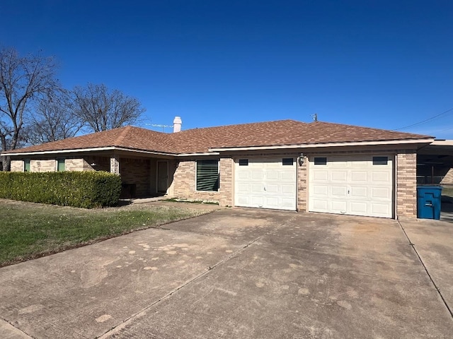 ranch-style home with a garage