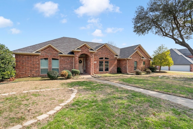 single story home featuring a front yard