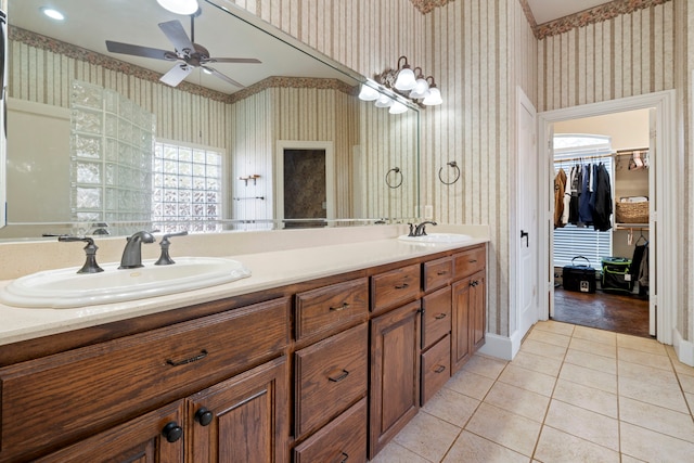 bathroom featuring vanity, tile patterned floors, and ceiling fan