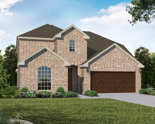 view of front of home featuring a garage and a front lawn