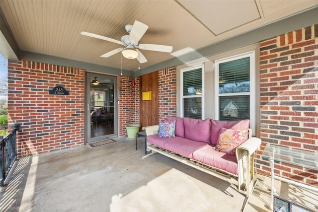 view of patio featuring ceiling fan