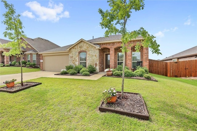 ranch-style house featuring a garage and a front lawn