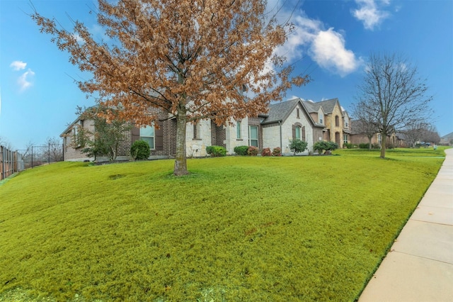 view of front of home with a front yard