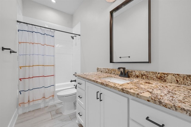 full bathroom with vanity, toilet, and shower / tub combo with curtain