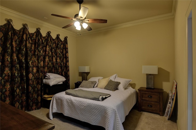 carpeted bedroom with crown molding and ceiling fan