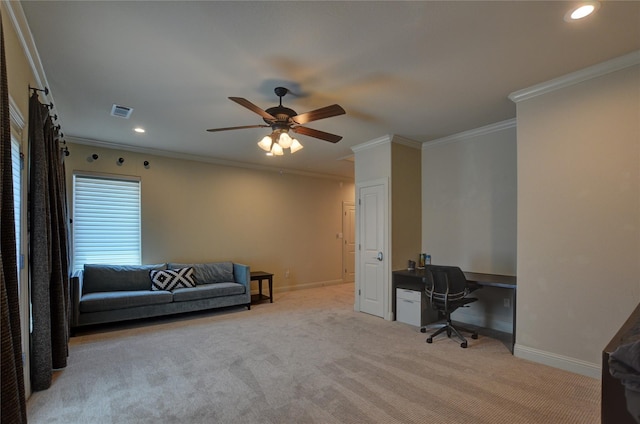 office featuring ceiling fan, light colored carpet, and ornamental molding