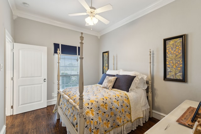 bedroom with crown molding, dark hardwood / wood-style floors, and ceiling fan