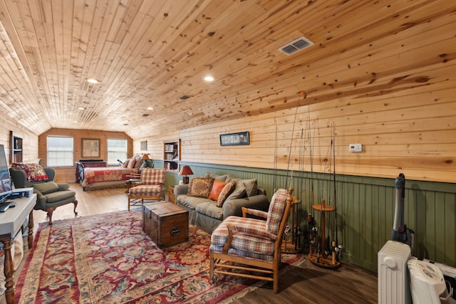 living room with wood ceiling, lofted ceiling, wood-type flooring, and radiator heating unit