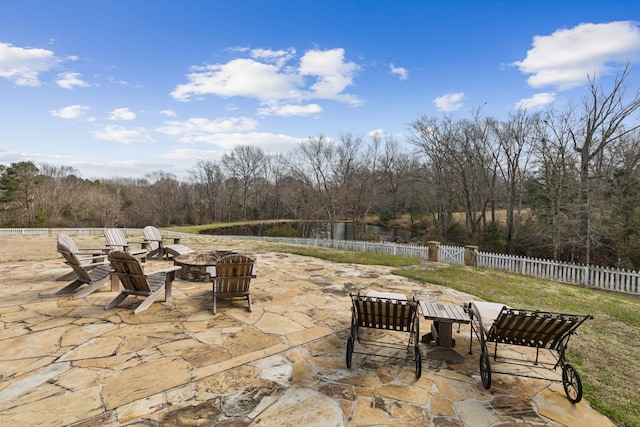 view of patio / terrace featuring a fire pit