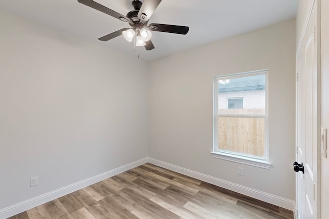 unfurnished room featuring ceiling fan and light hardwood / wood-style flooring