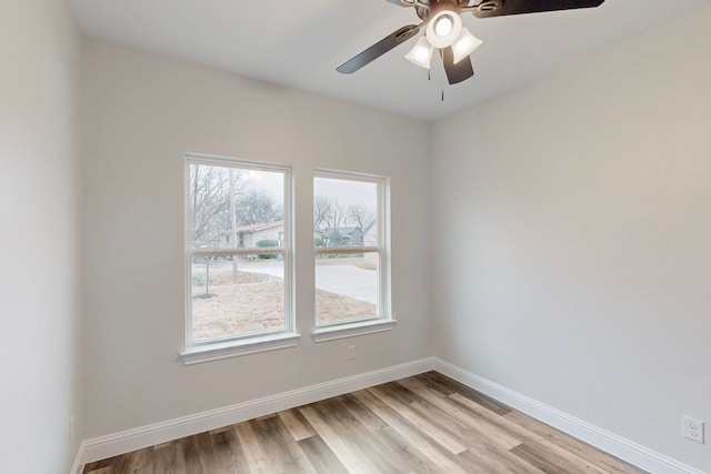 unfurnished room featuring ceiling fan and light hardwood / wood-style floors