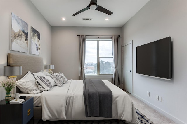 carpeted bedroom featuring ceiling fan