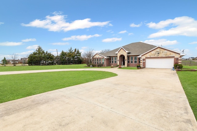 single story home featuring a garage and a front yard