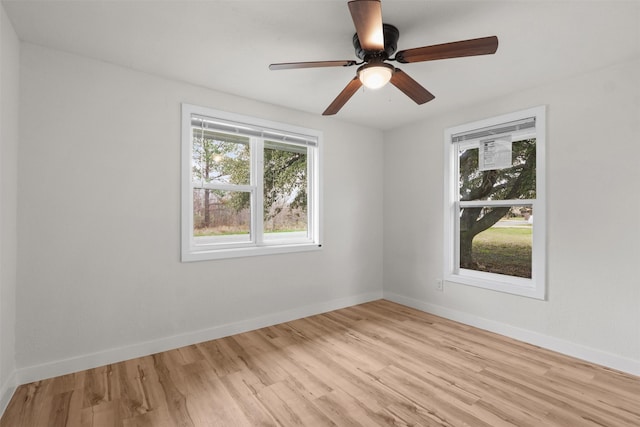 unfurnished room with ceiling fan and light hardwood / wood-style flooring