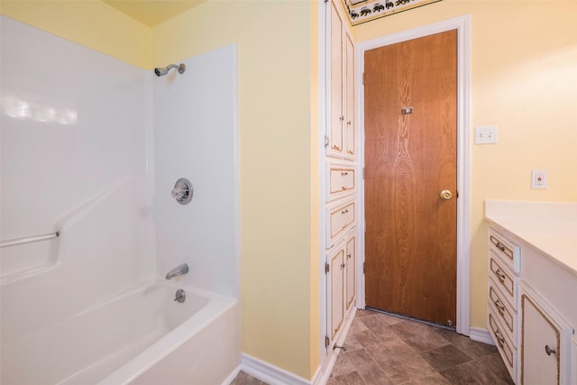 bathroom featuring vanity and tub / shower combination