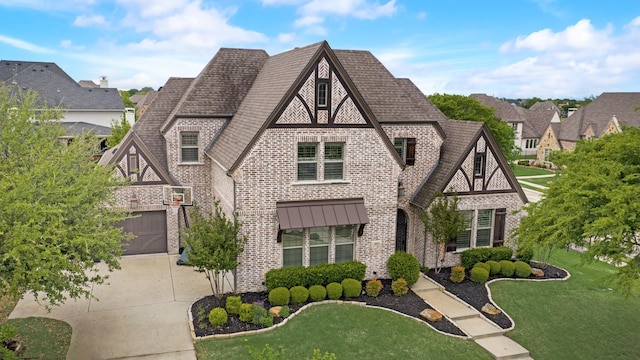 tudor-style house with a front lawn