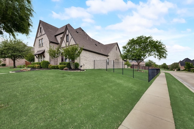 view of home's exterior with a lawn