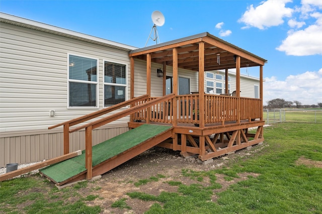 deck featuring a lawn