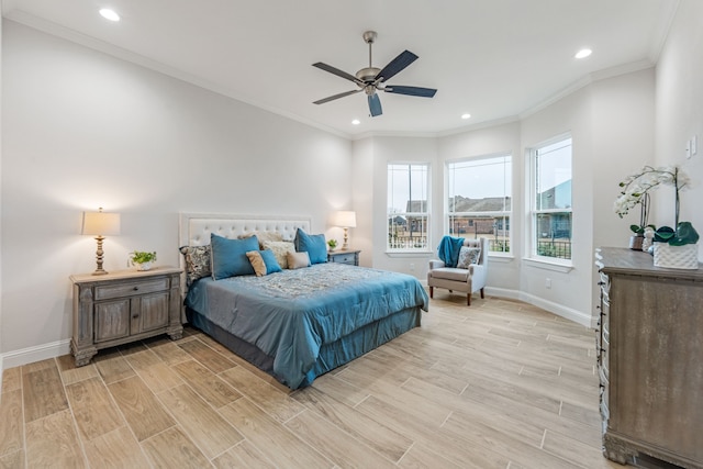 bedroom featuring ceiling fan and ornamental molding