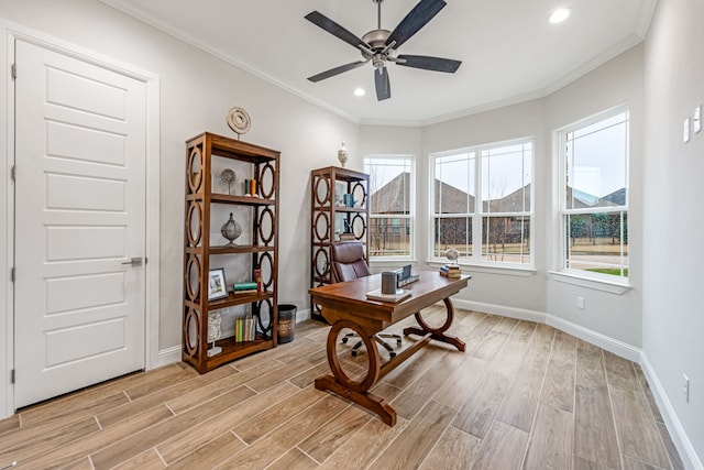 home office with crown molding and ceiling fan