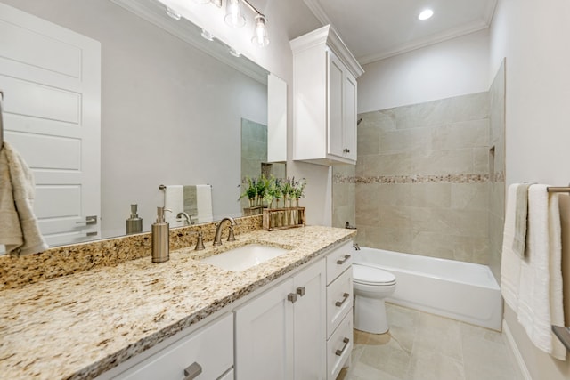 full bathroom with tiled shower / bath, ornamental molding, toilet, and vanity